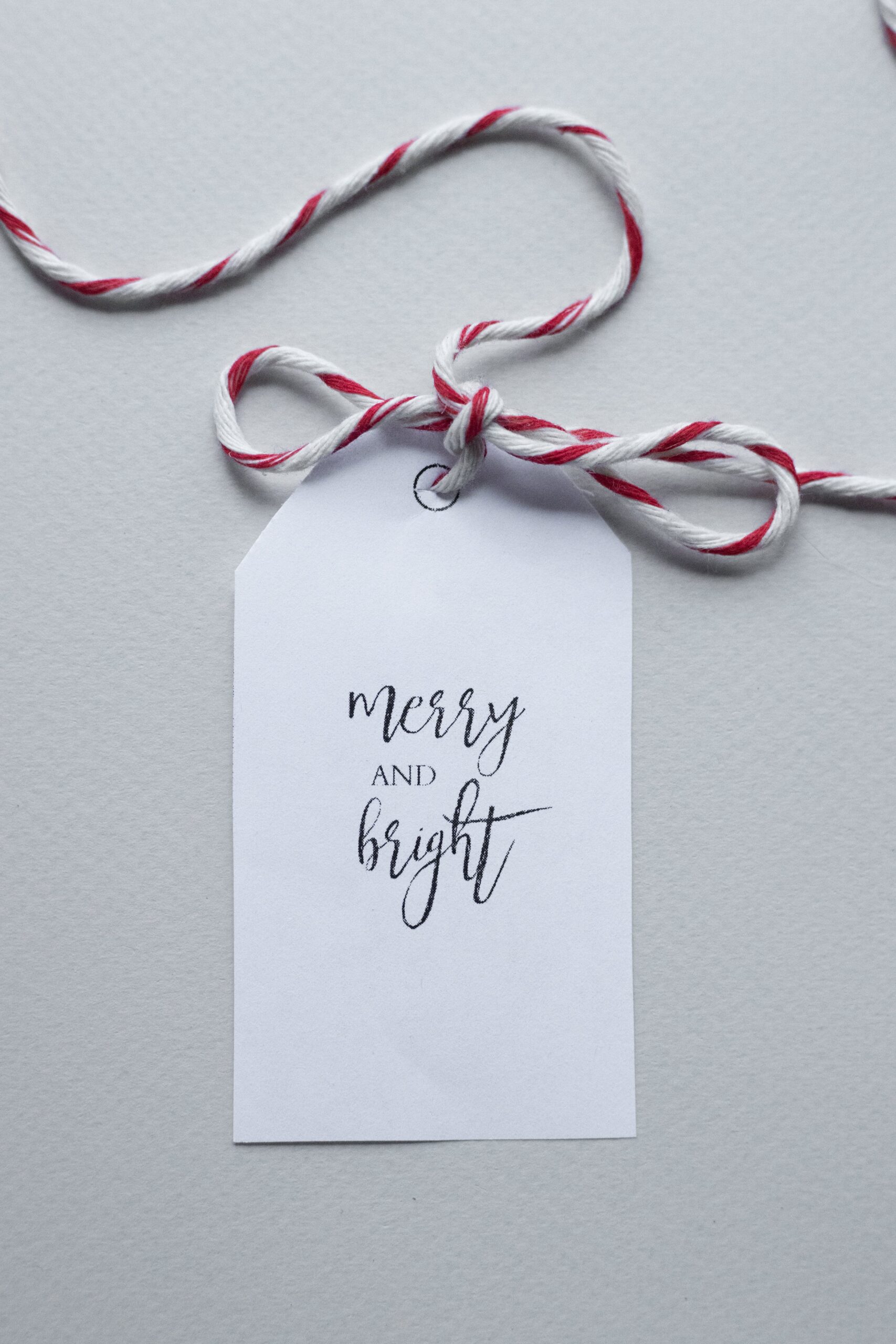 gift card that reads " merry and bright"