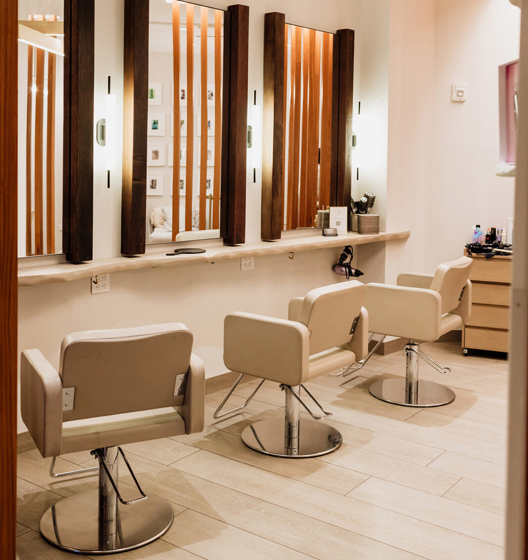 hair salon with white chairs