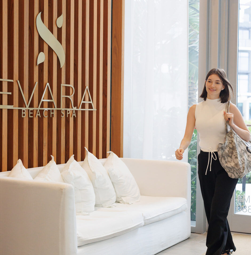 woman entering EVARA Beach Spa